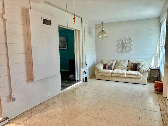 2020 World Parkway Blvd Unit 14, Clearwater, FL 33763 - living area with visible vents and light tile patterned flooring
