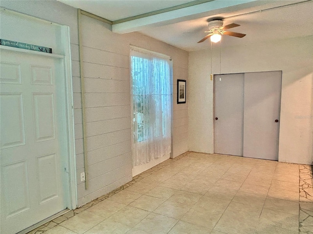 2020 World Parkway Blvd Unit 14, Clearwater, FL 33763 - unfurnished bedroom featuring a ceiling fan and a closet