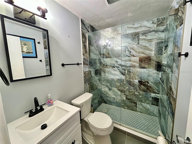 2020 World Parkway Blvd Unit 14, Clearwater, FL 33763 - full bath with toilet, a textured ceiling, a shower stall, and vanity