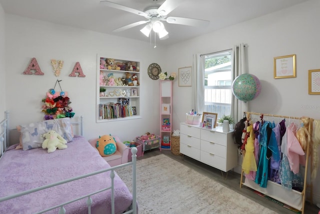 bedroom with wood finished floors and ceiling fan