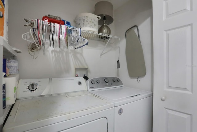 laundry room featuring laundry area and washing machine and dryer