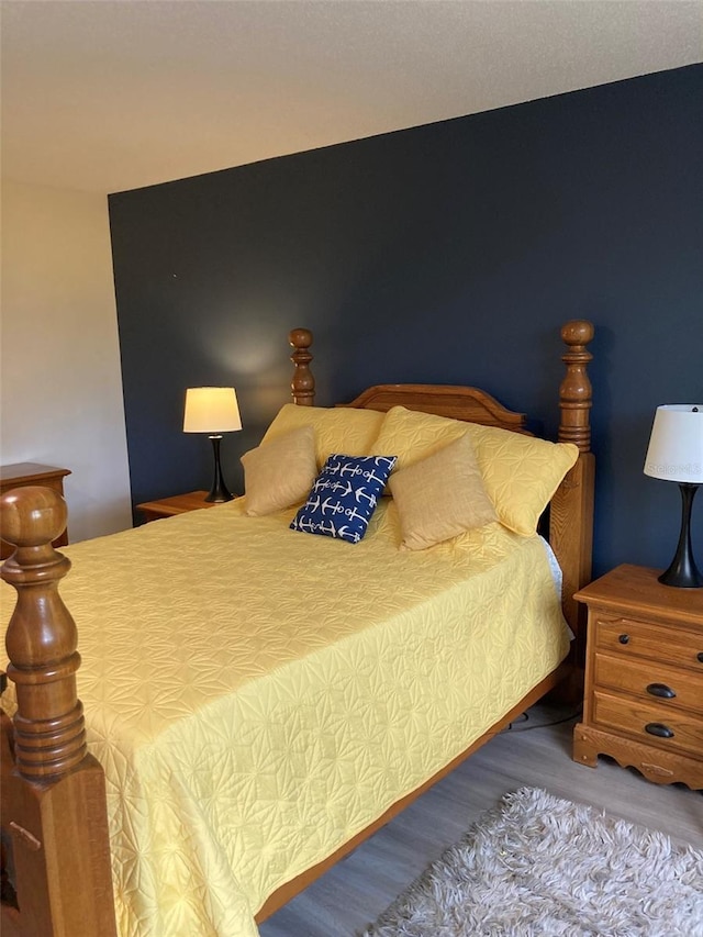7951 58th Ave N Unit 308, Saint Petersburg, FL 33709 - bedroom featuring wood finished floors