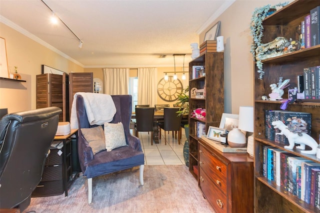 home office with light tile patterned floors, ornamental molding, and rail lighting