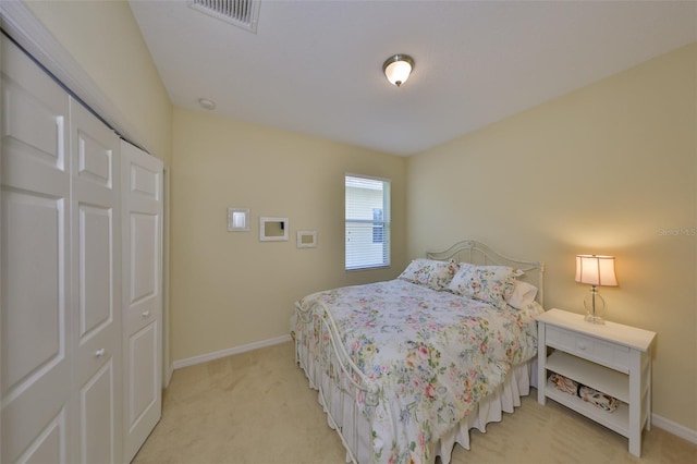 3315 Granite Ridge Loop, Land O Lakes, FL 34638 - bedroom with light colored carpet, visible vents, and baseboards