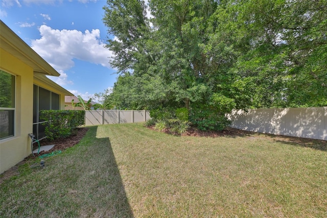 3315 Granite Ridge Loop, Land O Lakes, FL 34638 - view of yard with a fenced backyard