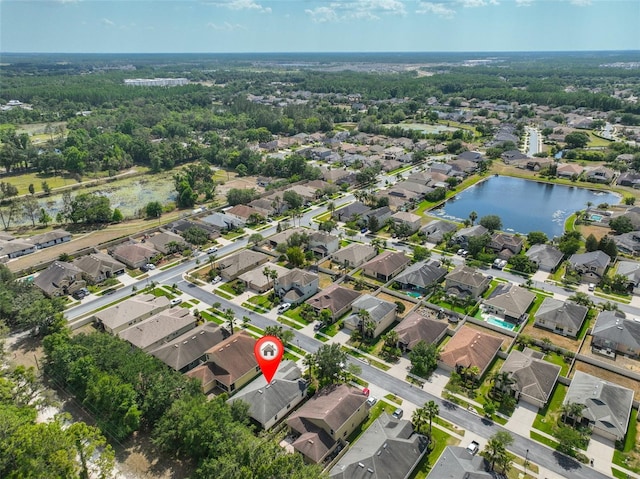 3315 Granite Ridge Loop, Land O Lakes, FL 34638 - aerial view featuring a water view and a residential view
