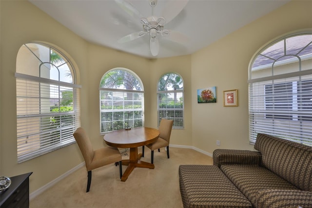 3315 Granite Ridge Loop, Land O Lakes, FL 34638 - dining room featuring baseboards, light carpet, and ceiling fan