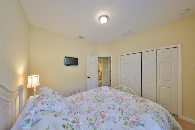 3315 Granite Ridge Loop, Land O Lakes, FL 34638 - bedroom featuring baseboards, carpet flooring, a closet, and visible vents