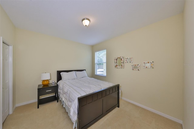 3315 Granite Ridge Loop, Land O Lakes, FL 34638 - bedroom with light colored carpet and baseboards