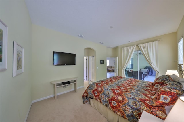 3315 Granite Ridge Loop, Land O Lakes, FL 34638 - bedroom featuring carpet, visible vents, baseboards, and arched walkways