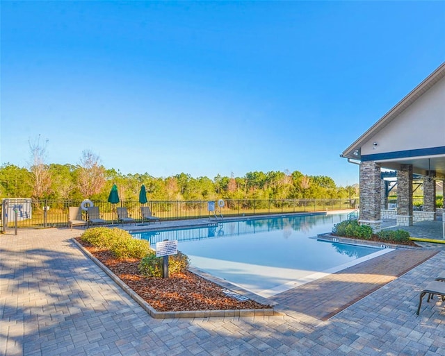 3315 Granite Ridge Loop, Land O Lakes, FL 34638 - pool featuring fence and a patio