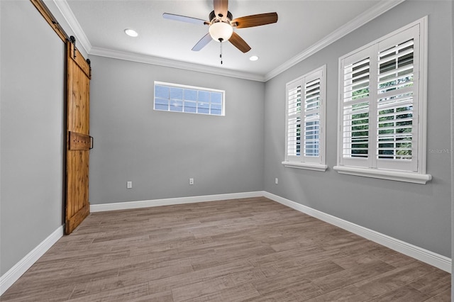 unfurnished room with ceiling fan, recessed lighting, baseboards, light wood-type flooring, and ornamental molding