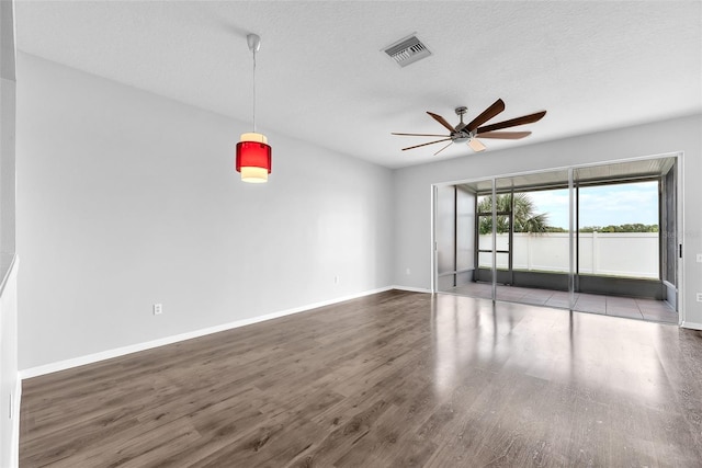 4862 Pond Ridge Dr, Riverview, FL 33578 - empty room featuring ceiling fan, wood finished floors, and baseboards