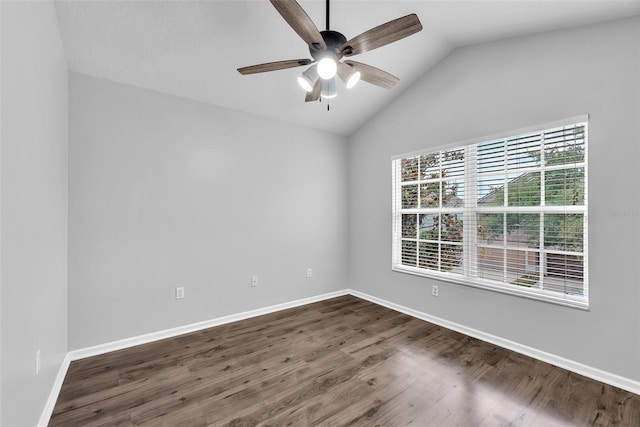 4862 Pond Ridge Dr, Riverview, FL 33578 - spare room featuring ceiling fan, dark wood-style floors, lofted ceiling, and baseboards