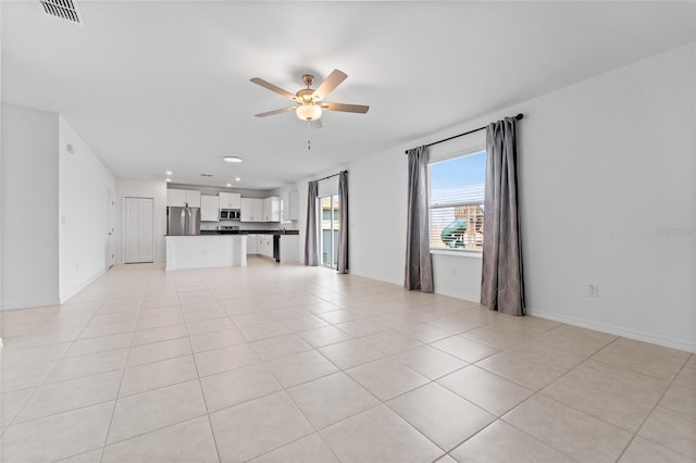 unfurnished living room featuring light tile patterned floors, visible vents, baseboards, recessed lighting, and a ceiling fan