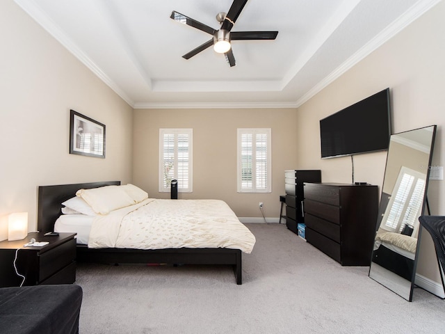 311 Vista Cruiser Ln, Oldsmar, FL 34677 - bedroom with a tray ceiling, light colored carpet, crown molding, baseboards, and a ceiling fan