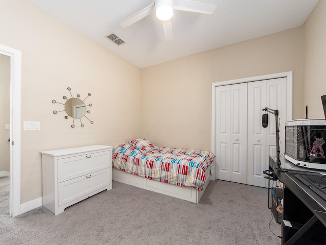 311 Vista Cruiser Ln, Oldsmar, FL 34677 - bedroom featuring light colored carpet, a closet, a ceiling fan, and baseboards