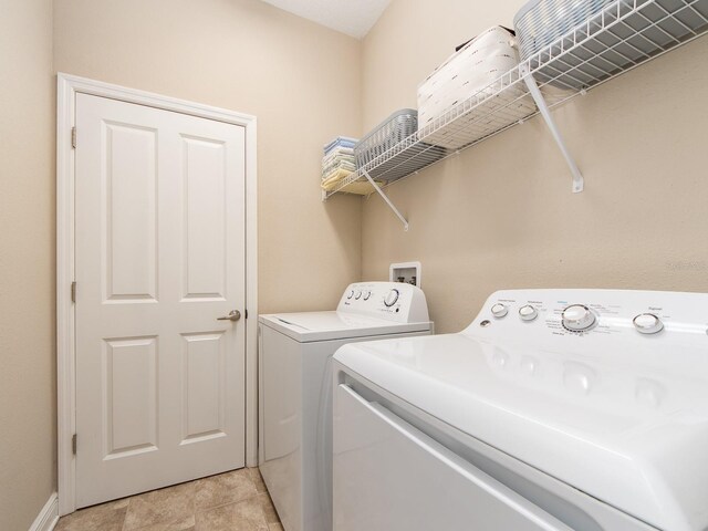 311 Vista Cruiser Ln, Oldsmar, FL 34677 - washroom featuring washer and clothes dryer and baseboards