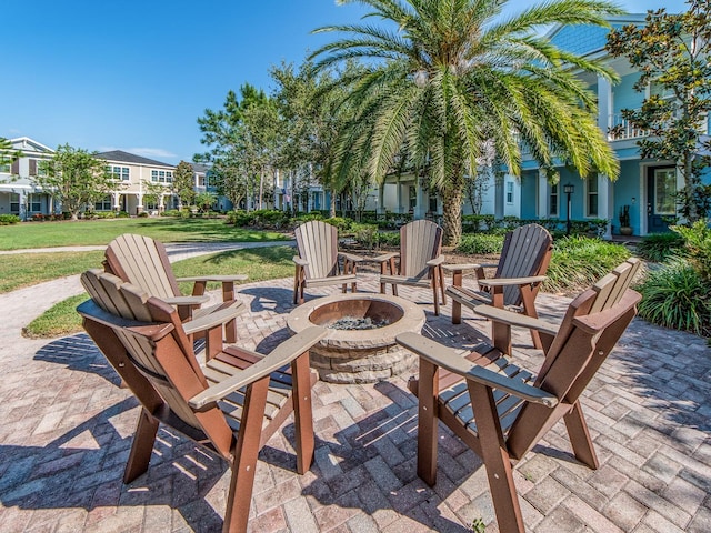 311 Vista Cruiser Ln, Oldsmar, FL 34677 - view of patio with an outdoor fire pit