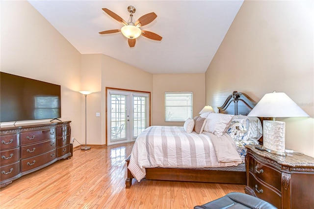 bedroom featuring access to exterior, light wood-style flooring, a ceiling fan, baseboards, and lofted ceiling