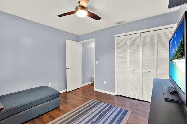 unfurnished room featuring visible vents, a ceiling fan, baseboards, and wood finished floors