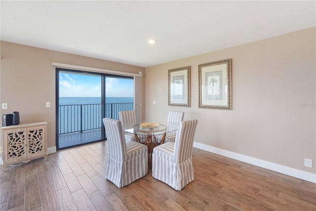 433 Mariner Dr Unit 433, Tarpon Springs, FL 34689 - dining space featuring recessed lighting, baseboards, and wood finished floors