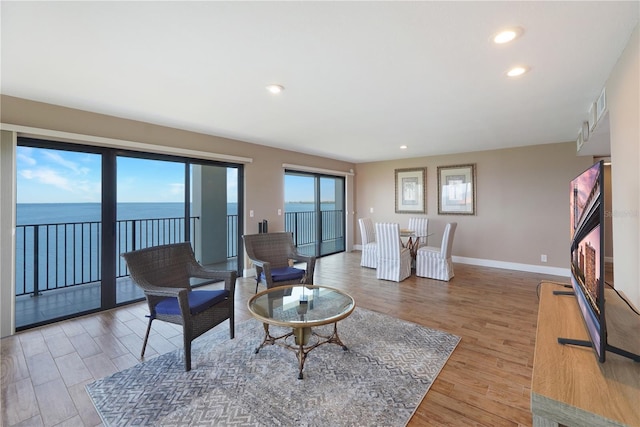 433 Mariner Dr Unit 433, Tarpon Springs, FL 34689 - living area featuring light wood-style floors, recessed lighting, baseboards, and visible vents