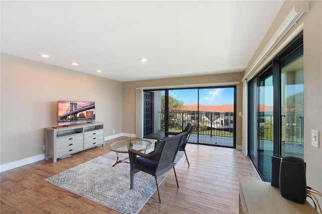 433 Mariner Dr Unit 433, Tarpon Springs, FL 34689 - living area with baseboards, recessed lighting, and light wood-style flooring
