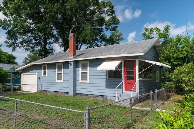 1716 11th Ave N, Saint Petersburg, FL 33713 - view of front of property featuring entry steps, a chimney, crawl space, a fenced backyard, and a garage
