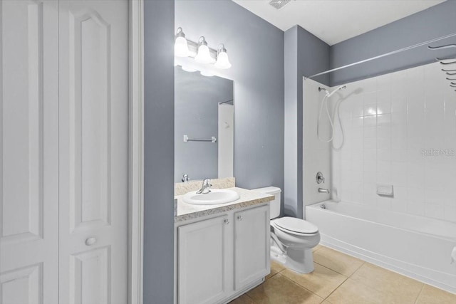bathroom with vanity, toilet, bathtub / shower combination, and tile patterned floors