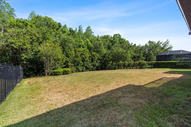 view of yard featuring fence