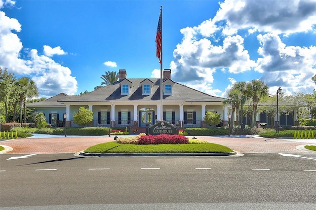 view of property featuring decorative driveway