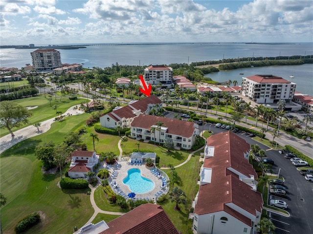 6011 Bahia Del Mar Blvd Unit 158, Saint Petersburg, FL 33715 - drone / aerial view of a large body of water, a pool area, apartment complex, and a golf club