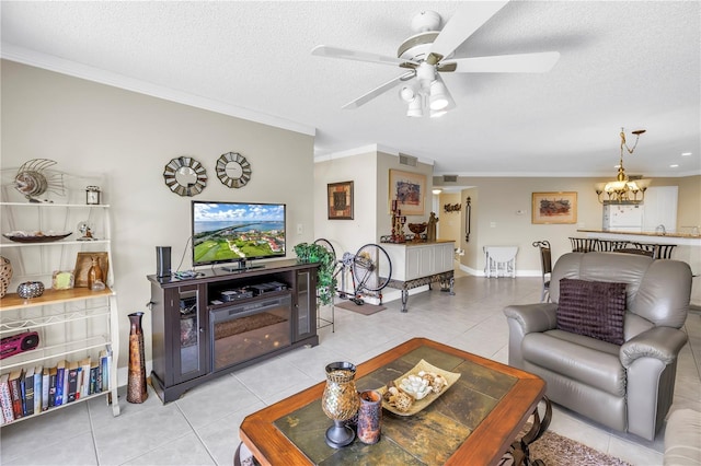 6011 Bahia Del Mar Blvd Unit 158, Saint Petersburg, FL 33715 - living room featuring light tile patterned flooring, crown molding, a textured ceiling, a chandelier, and a ceiling fan