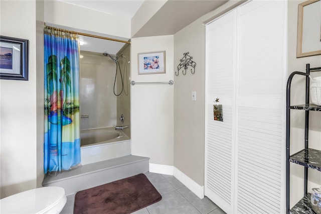6011 Bahia Del Mar Blvd Unit 158, Saint Petersburg, FL 33715 - full bath featuring shower / bathtub combination with curtain, toilet, tile patterned flooring, and baseboards