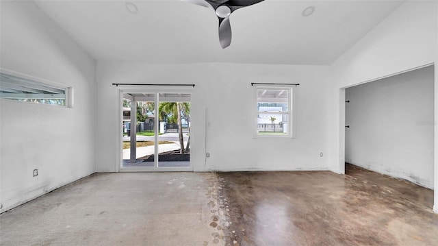 unfurnished room with concrete flooring and a healthy amount of sunlight