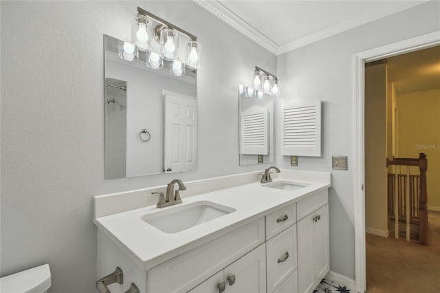 full bathroom featuring a sink, double vanity, ornamental molding, and toilet