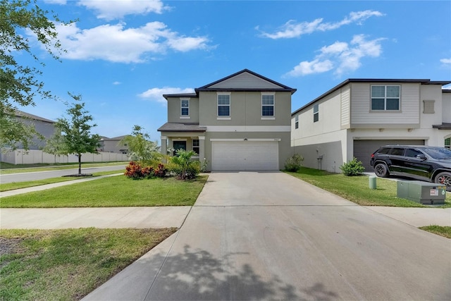 traditional-style house with an attached garage, stucco siding, driveway, and a front yard
