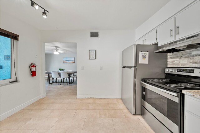 kitchen featuring white cabinets, stainless steel range with electric cooktop, ceiling fan, under cabinet range hood, and visible vents