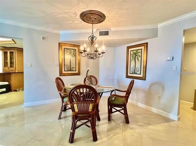 dining space with crown molding, baseboards, and visible vents