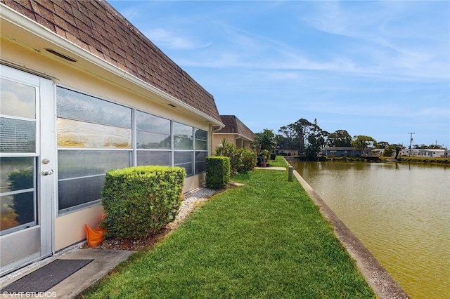 623 Park Cir Unit 623, Bradenton, FL 34207 - view of yard featuring a water view