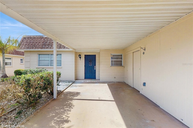 623 Park Cir Unit 623, Bradenton, FL 34207 - doorway to property featuring a carport
