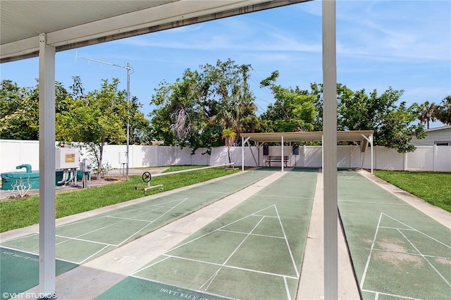 623 Park Cir Unit 623, Bradenton, FL 34207 - view of home's community with a lawn, shuffleboard, and fence