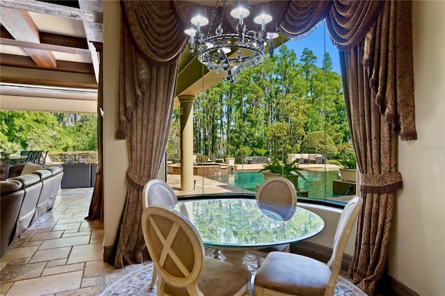1102 Merry Water Dr, Lutz, FL 33548 - interior space featuring an inviting chandelier, coffered ceiling, and beamed ceiling