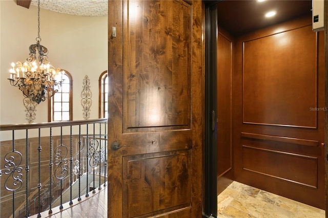 1102 Merry Water Dr, Lutz, FL 33548 - interior details featuring a notable chandelier and elevator