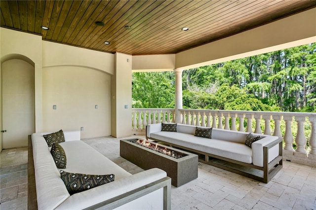 1102 Merry Water Dr, Lutz, FL 33548 - view of patio / terrace with an outdoor living space with a fire pit