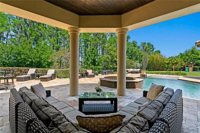 1102 Merry Water Dr, Lutz, FL 33548 - view of patio / terrace with outdoor lounge area and an outdoor pool