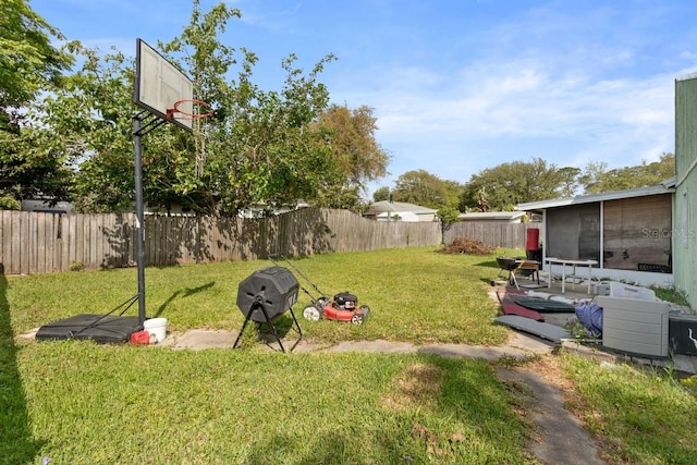 view of yard with a fenced backyard