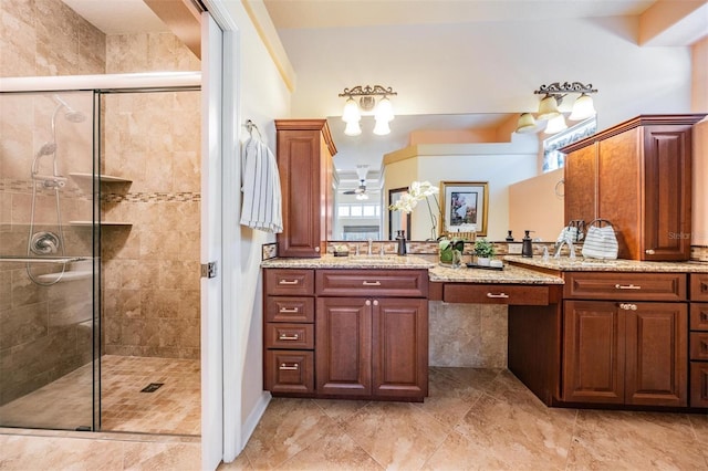 bathroom with vanity, a ceiling fan, tile patterned flooring, and a stall shower