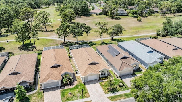 birds eye view of property with a residential view